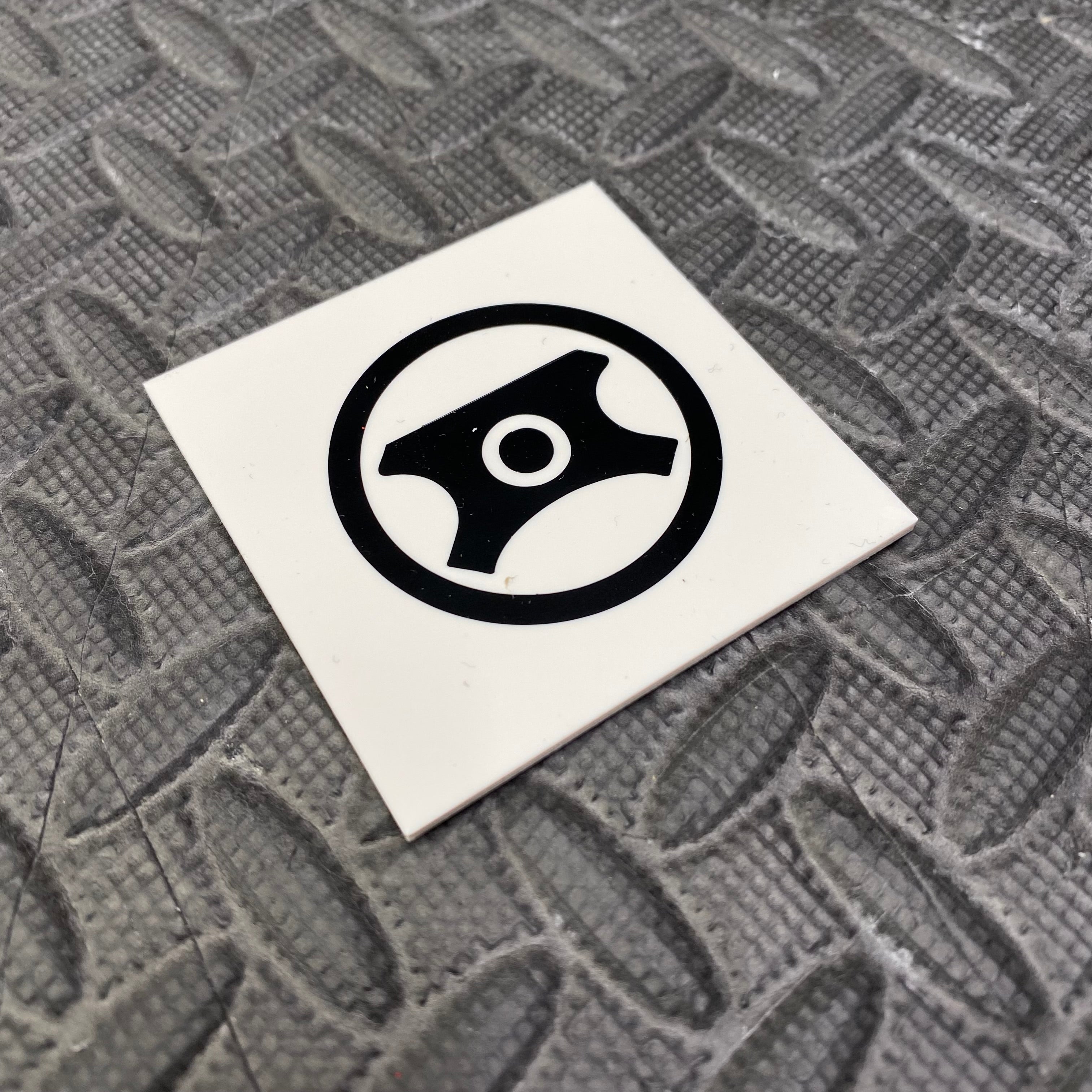 Autocollant en vinyle pour capuchon de direction assistée