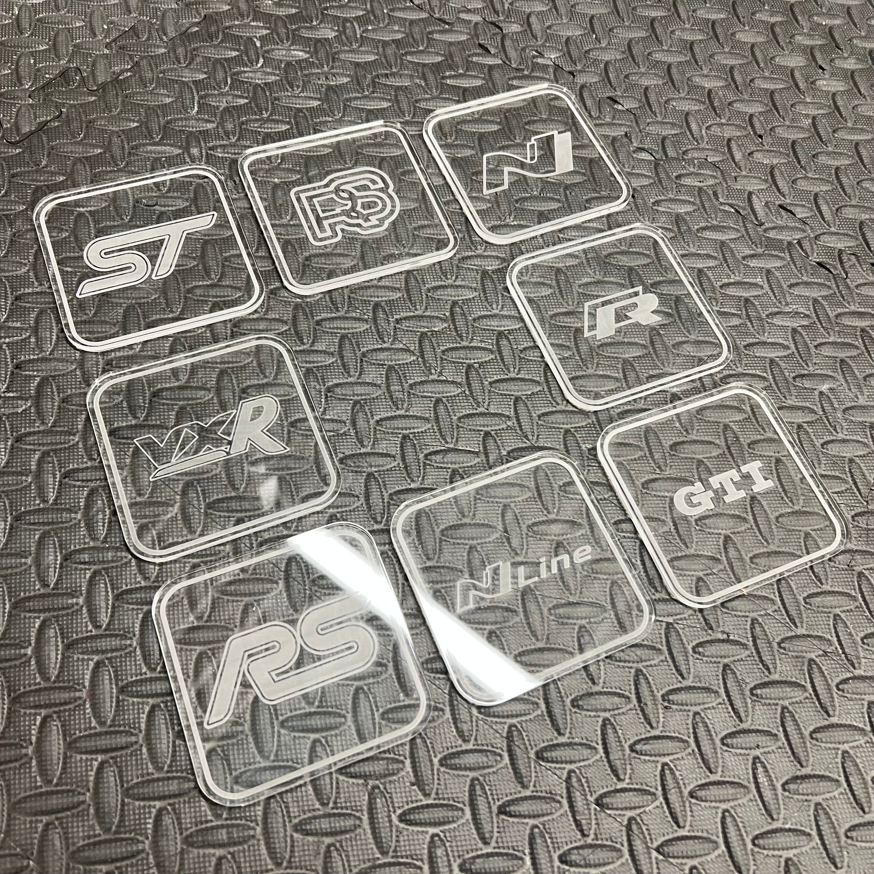 Dessous de verre gravé au laser - Différents logos