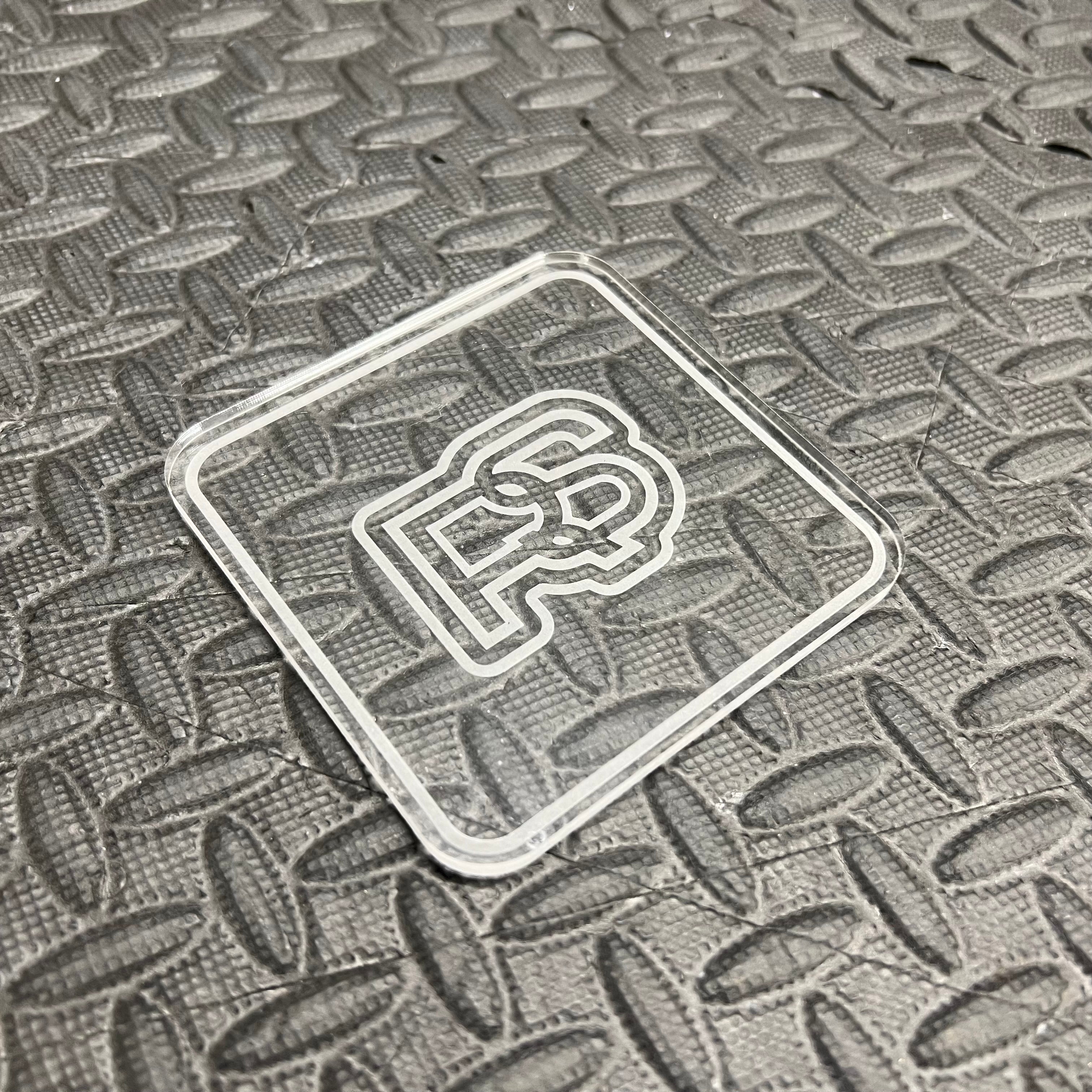 Dessous de verre gravé au laser - Différents logos