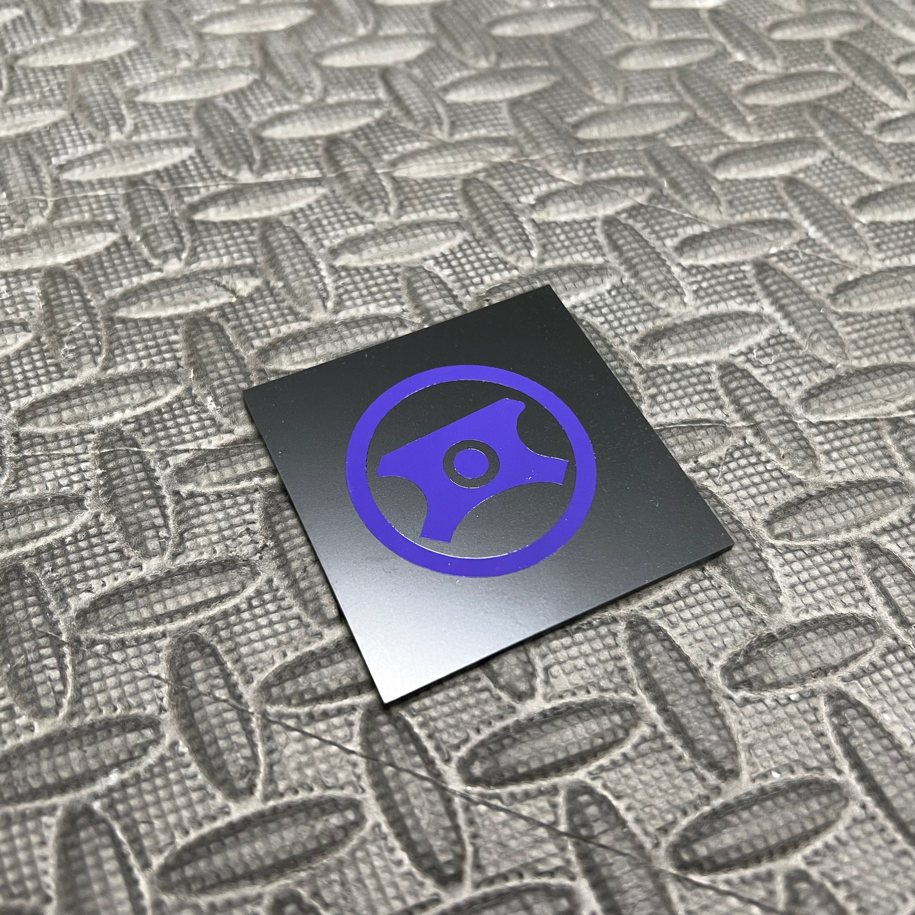 Autocollant en vinyle pour capuchon de direction assistée