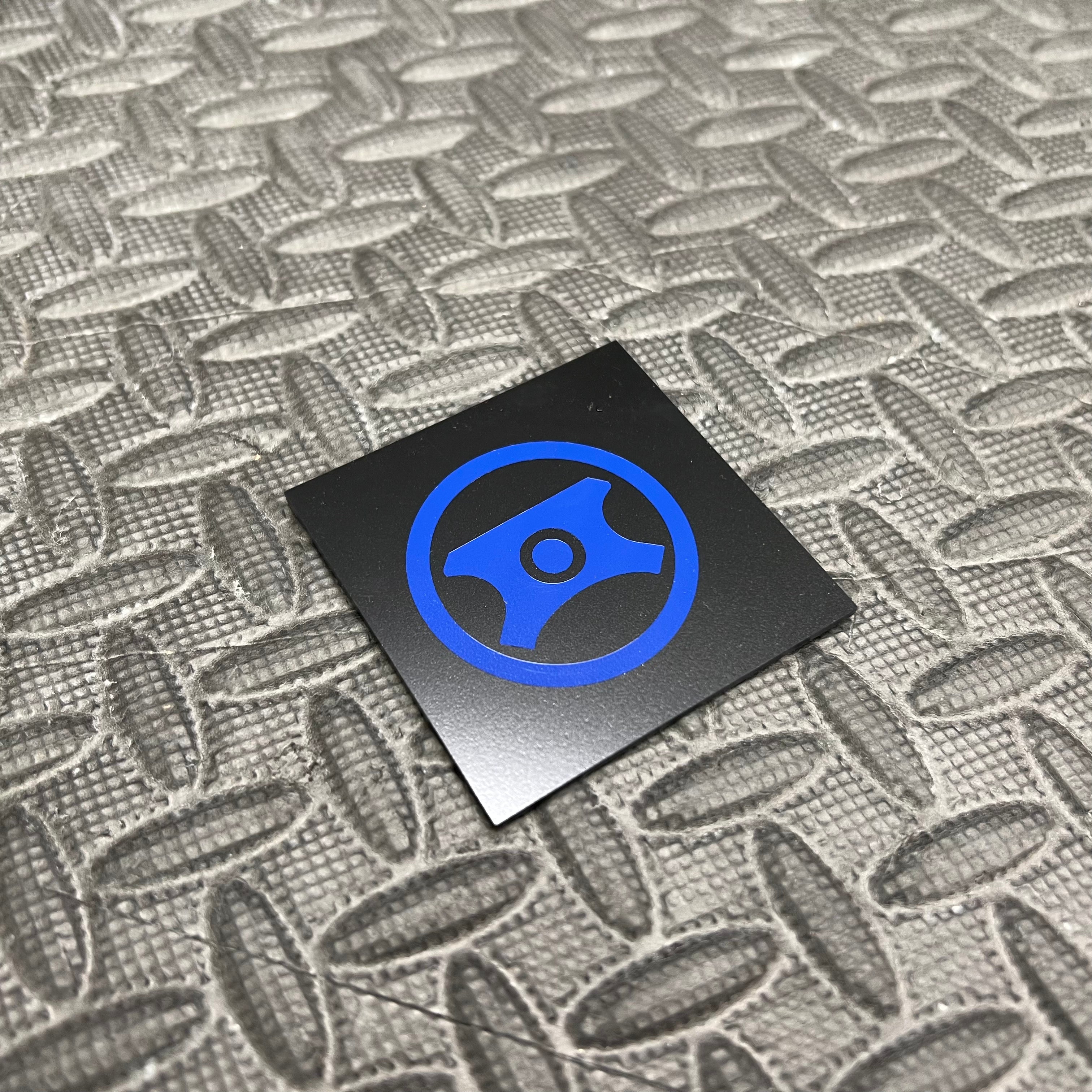 Autocollant en vinyle pour capuchon de direction assistée