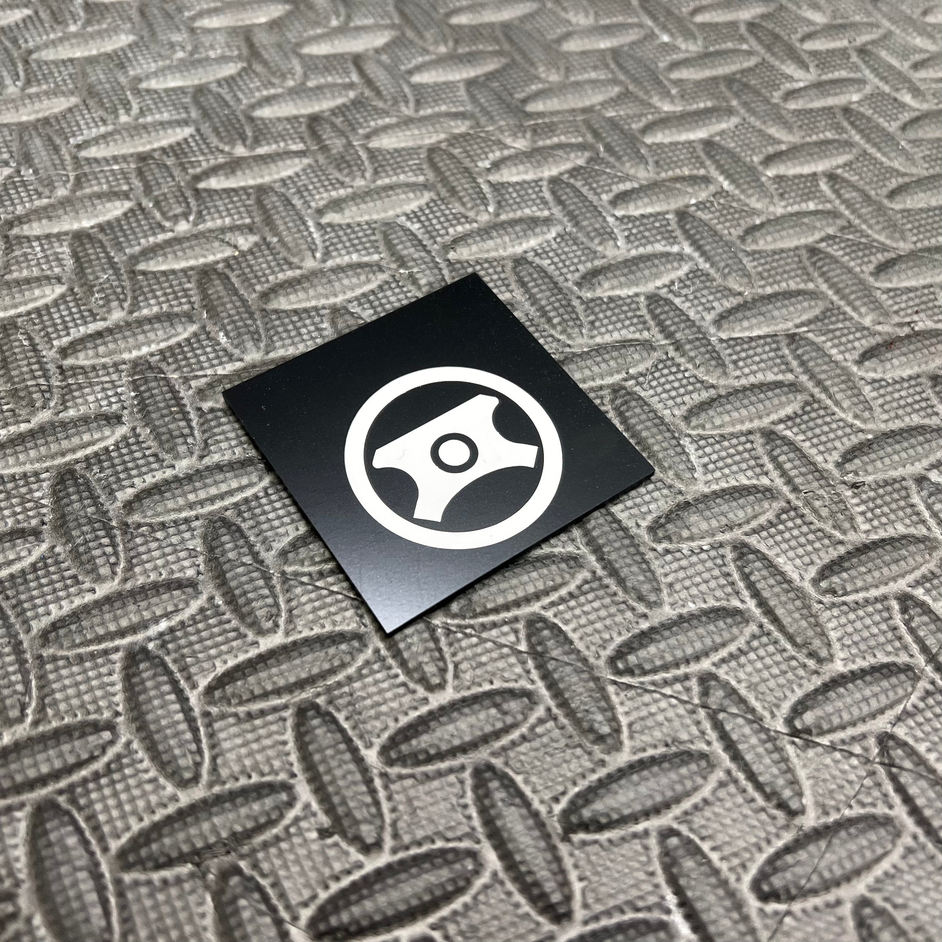Autocollant en vinyle pour capuchon de direction assistée