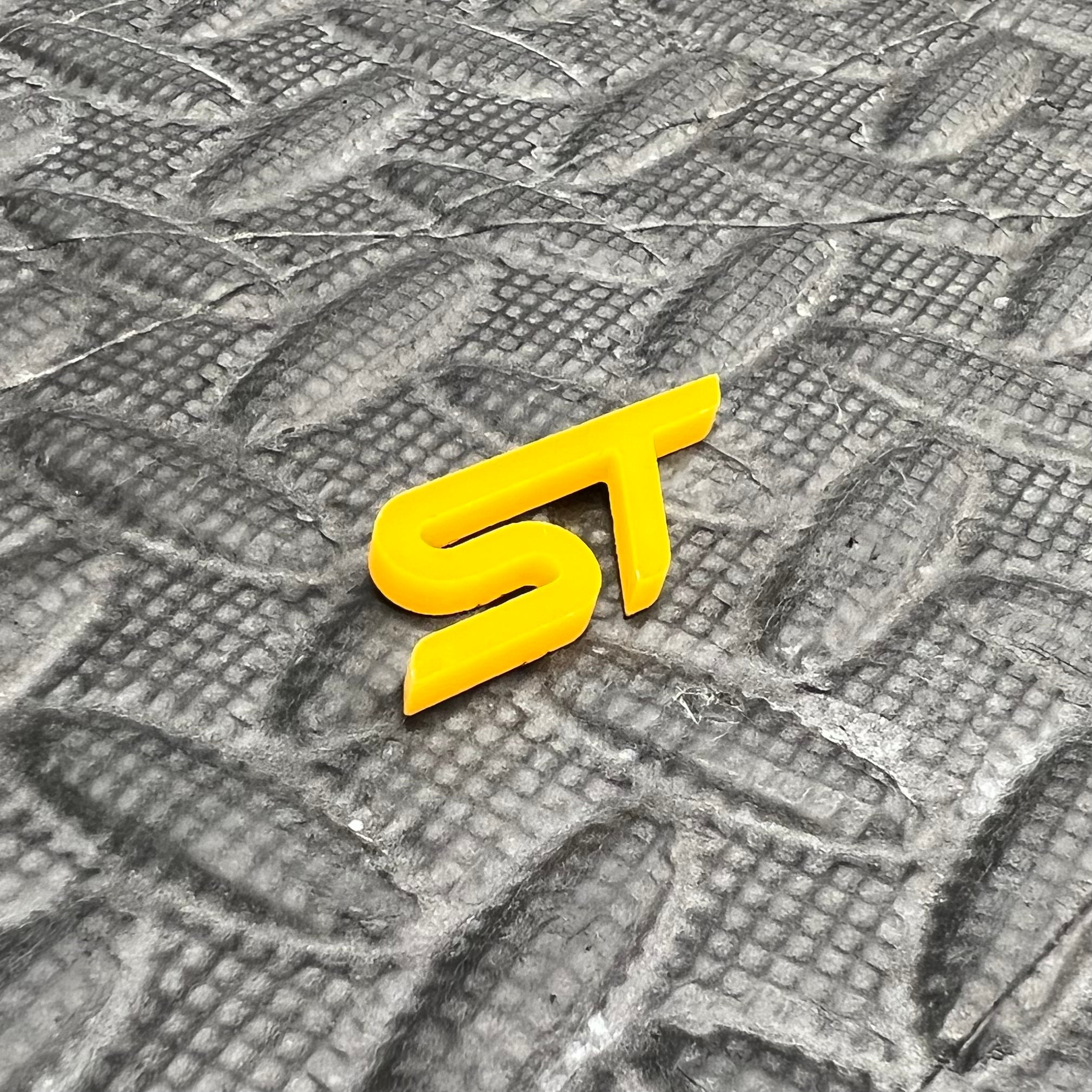 ST Logo Acrylic Badge in Yellow