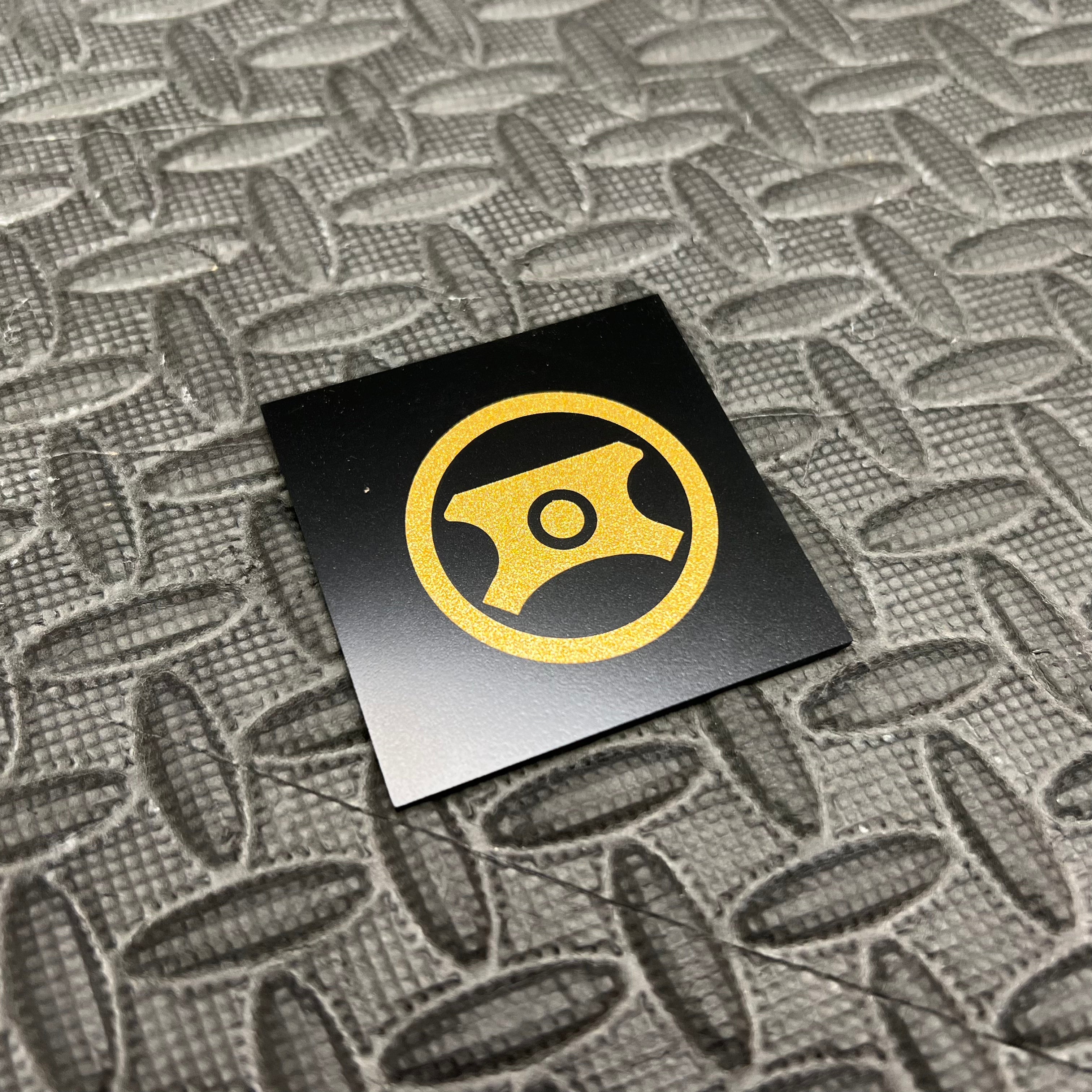 Autocollant en vinyle pour capuchon de direction assistée