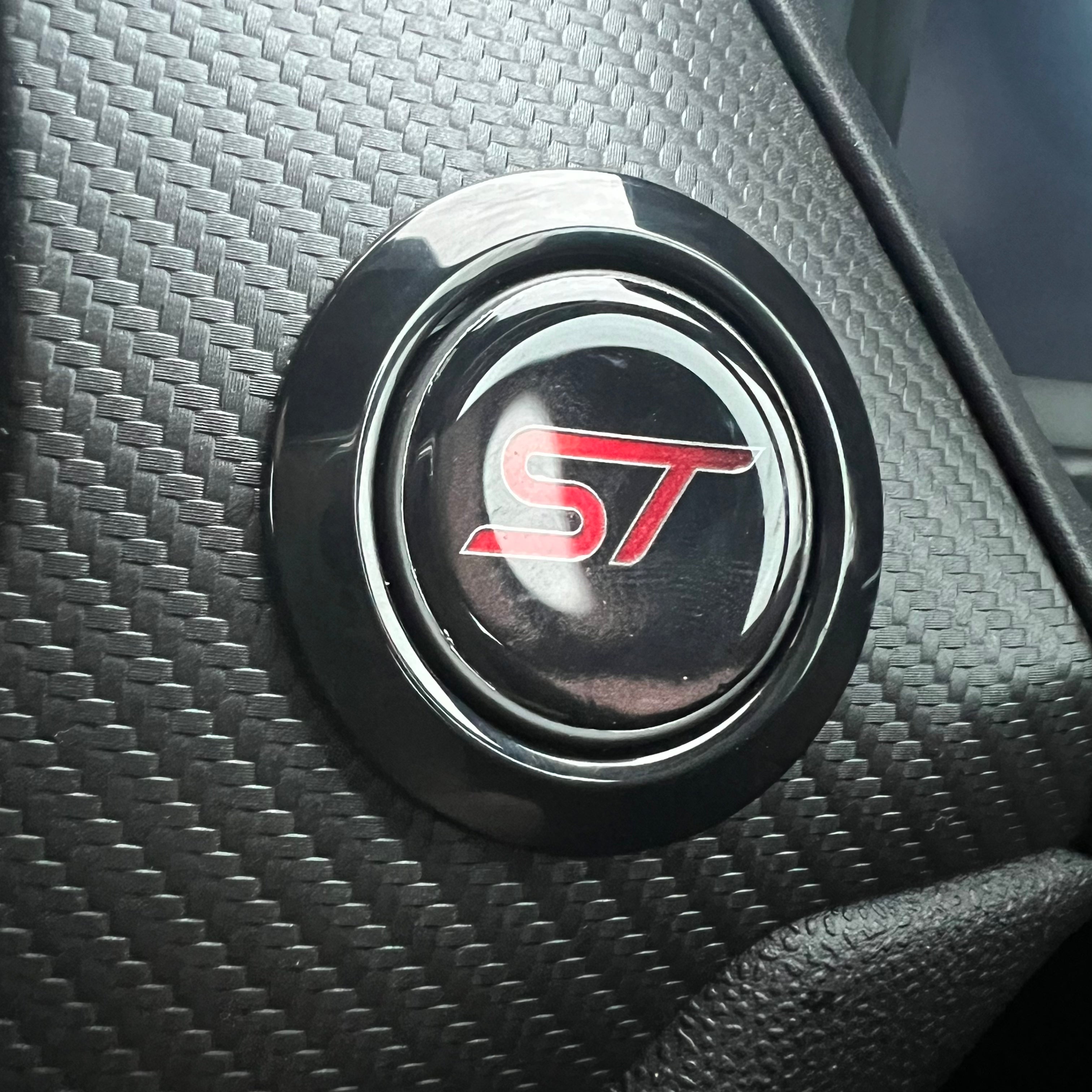 Push button start badges
