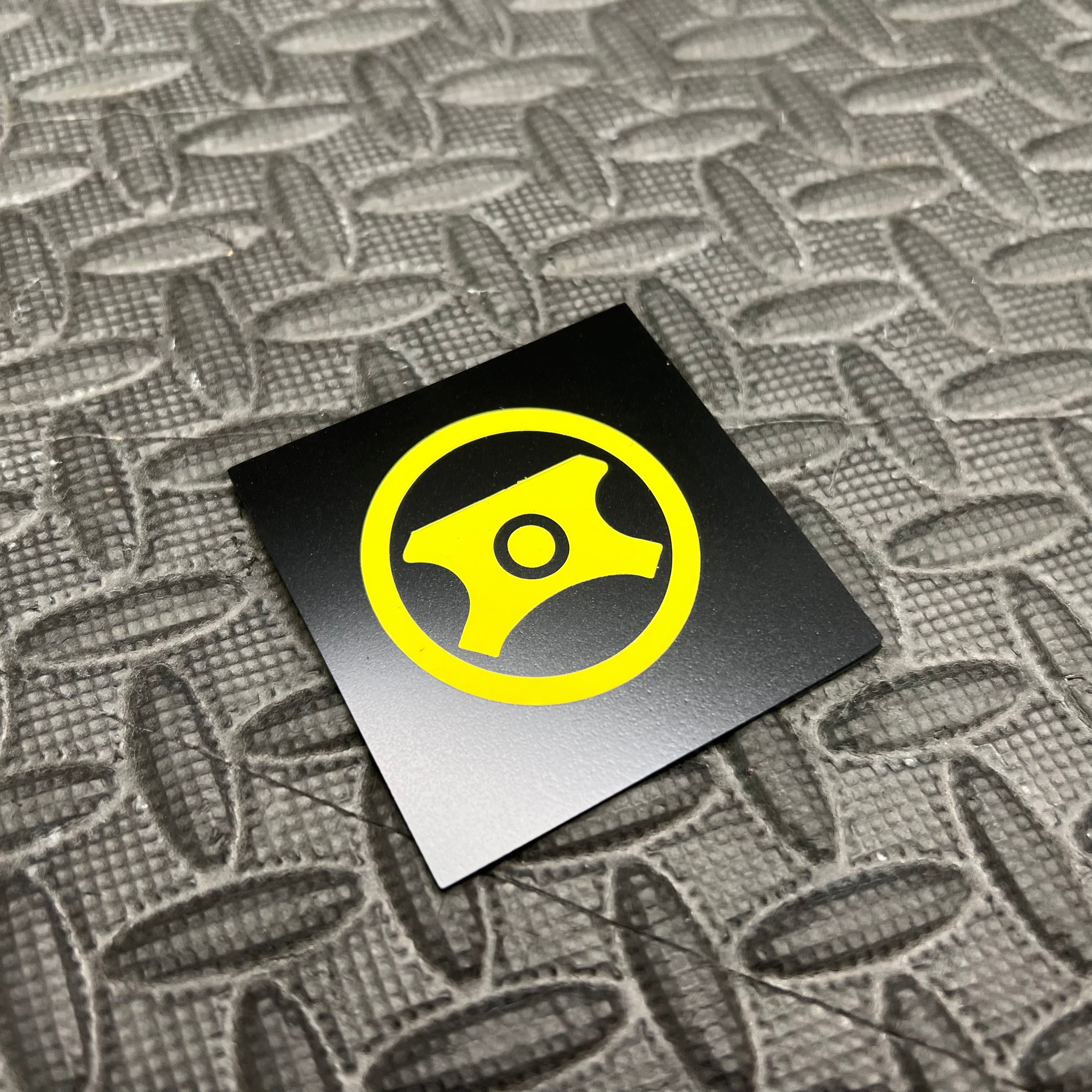 Autocollant en vinyle pour capuchon de direction assistée