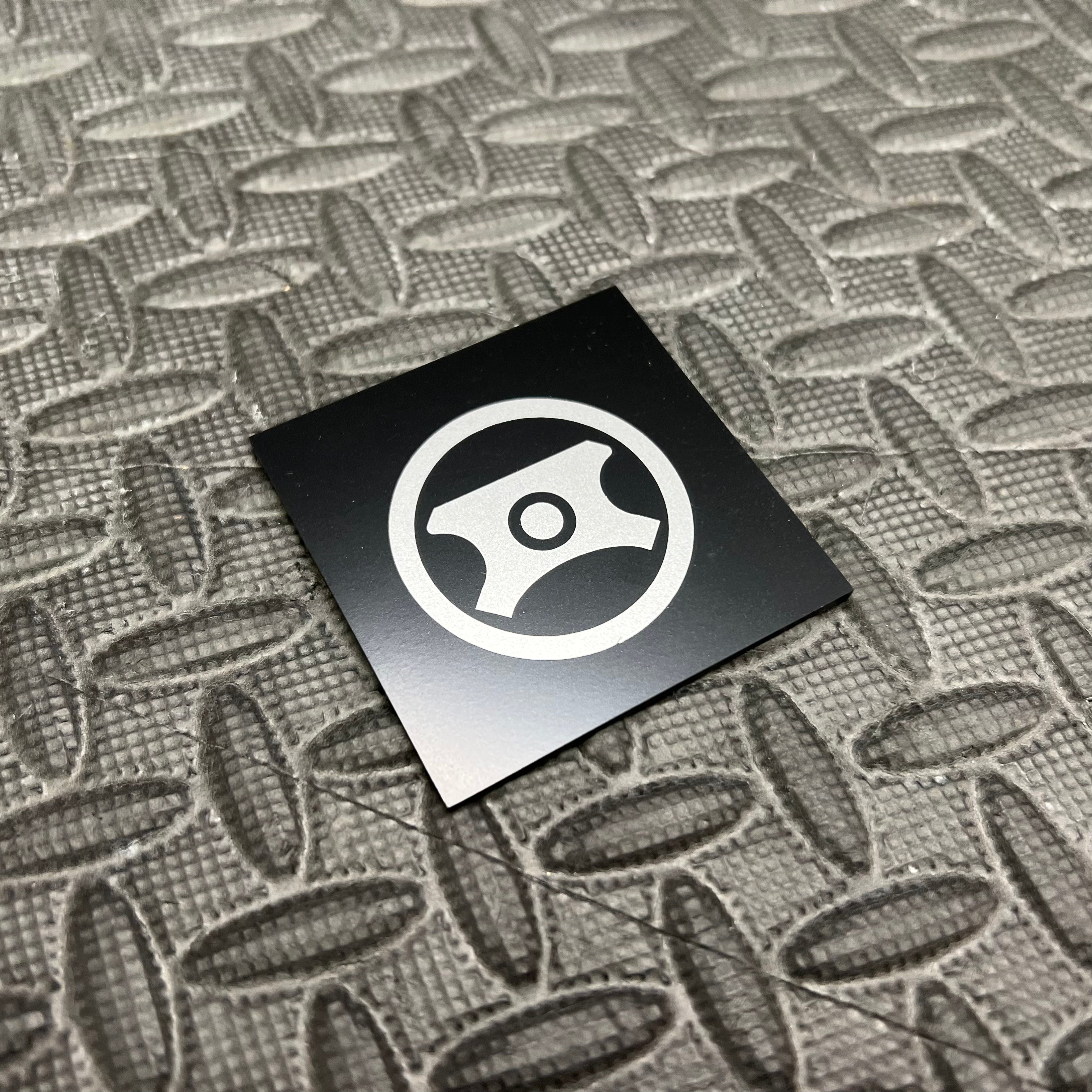 Autocollant en vinyle pour capuchon de direction assistée