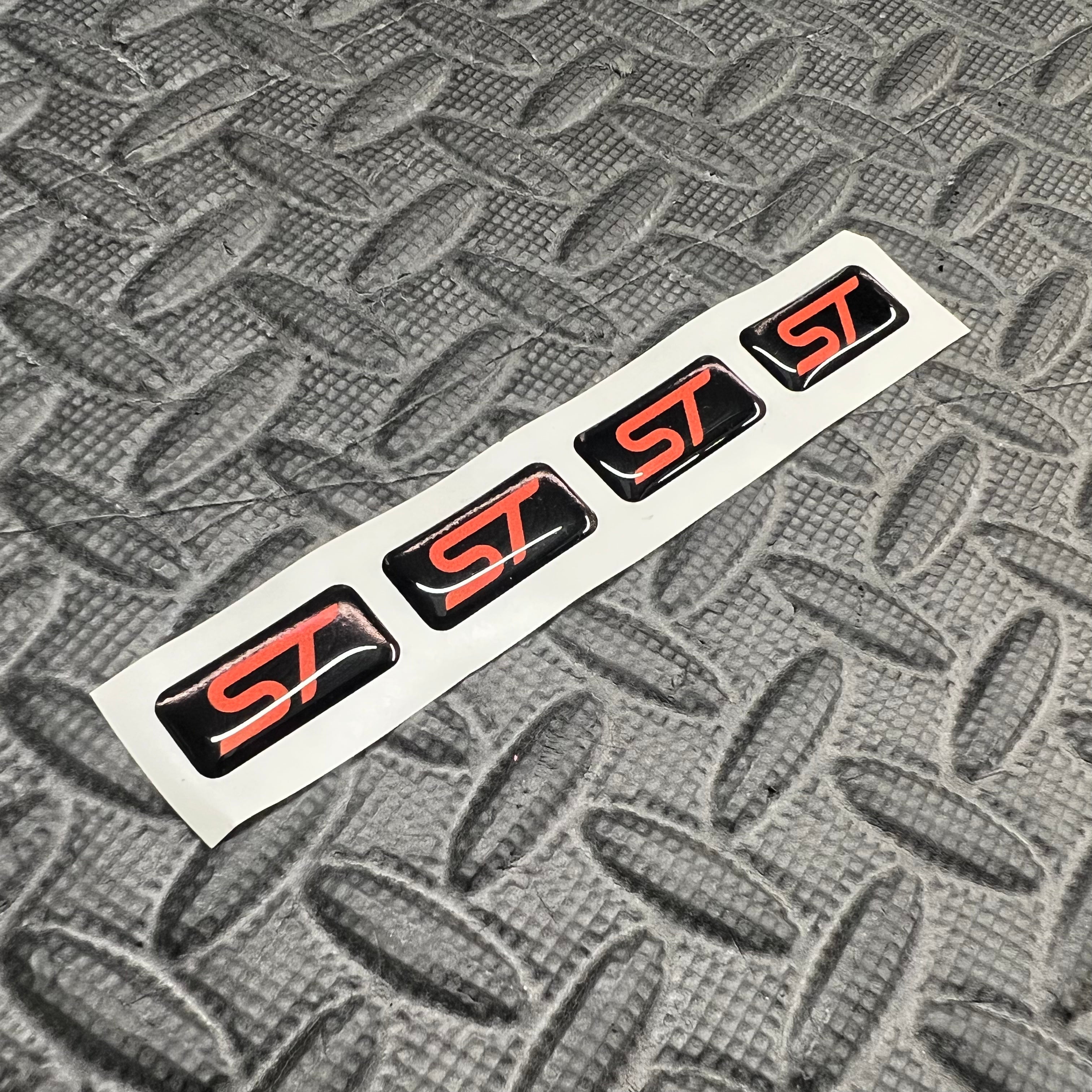 Lot de 4 incrustations de gel pour jantes Ford Focus RS - Logo « ST » ou « RS »