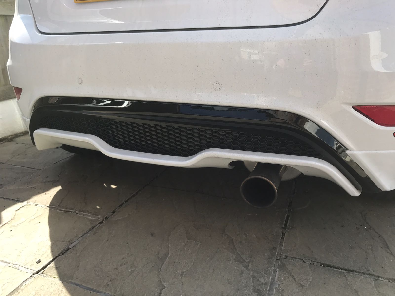 Genuine Ford Mk7.5 Ford Fiesta ST180/ST200 Rear Upper Diffuser - Gloss Black Painted