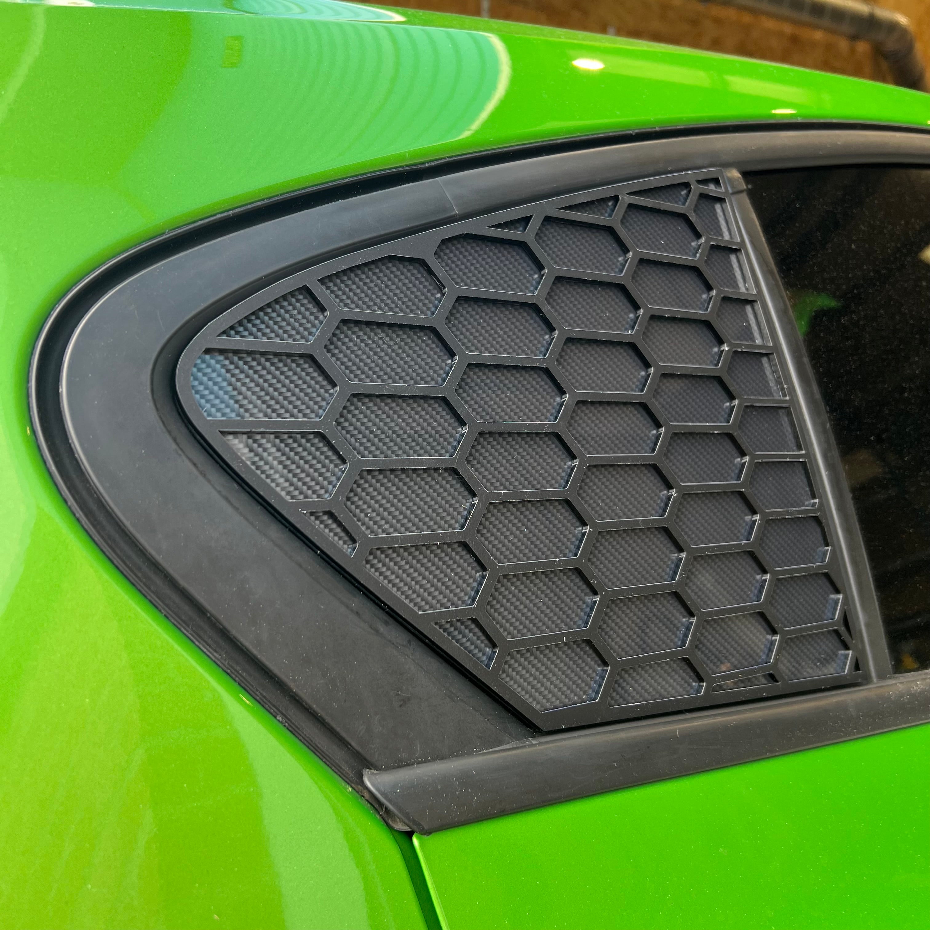 Proform Mk4/4.5 Focus (Hatchback) Rear Quarter Window Inserts - Satin Black Hexagon Design With Carbon Fibre Effect Back Plate
