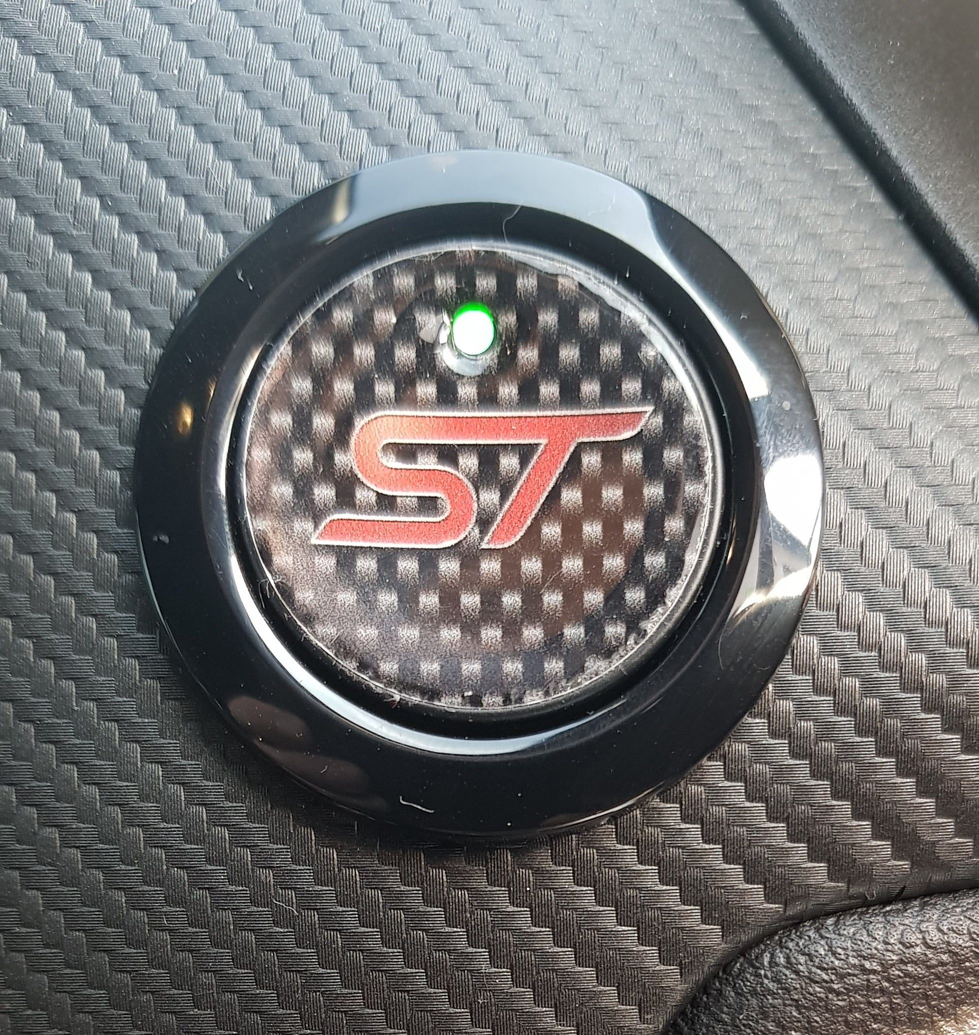 Push button start badges