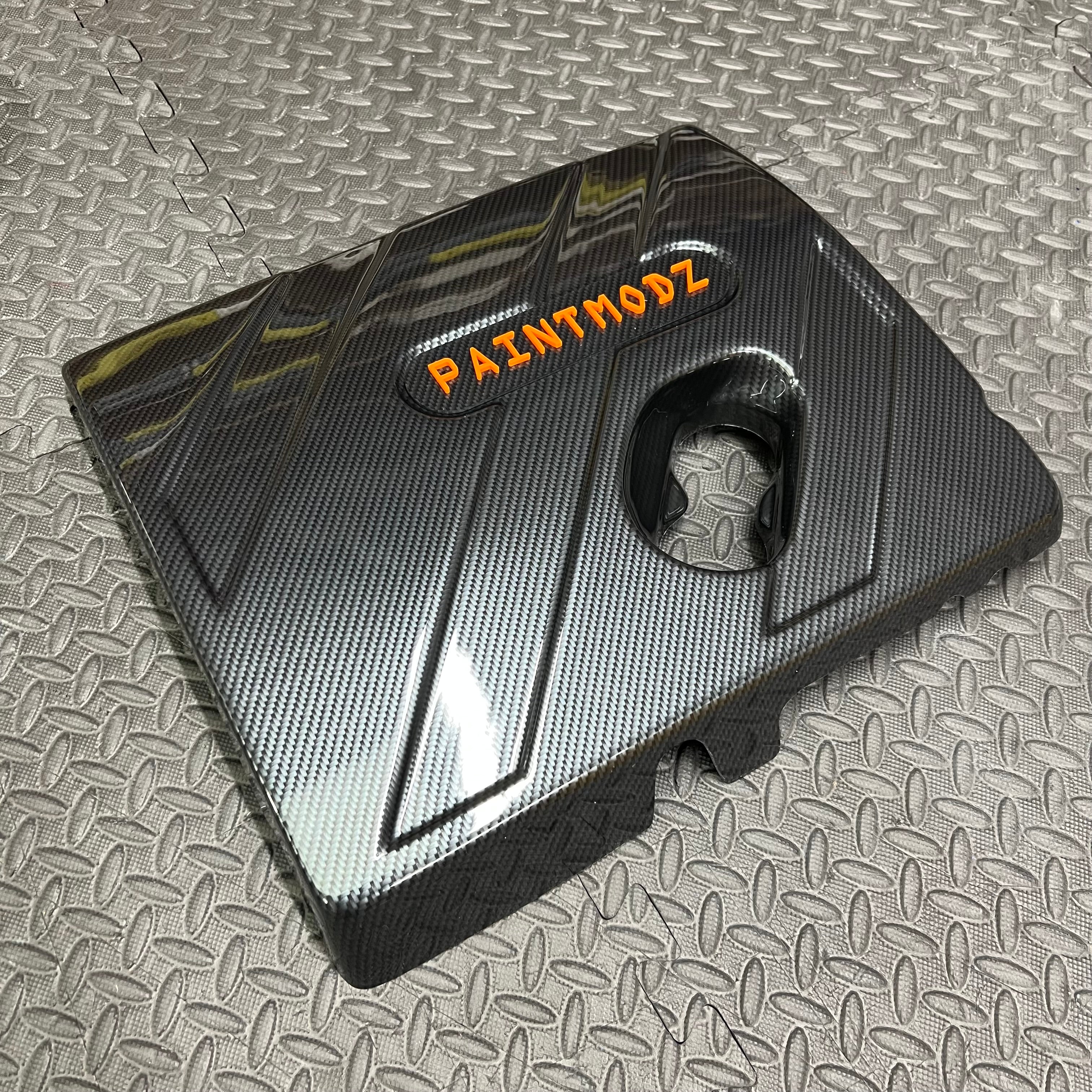 Proform Engine Cover - MK8/8.5 Fiesta ST & Mk2 Puma ST - Deluxe Carbon Fibre Effect Plastic With Orange/Deluxe Carbon Fibre Effect Badge Plate