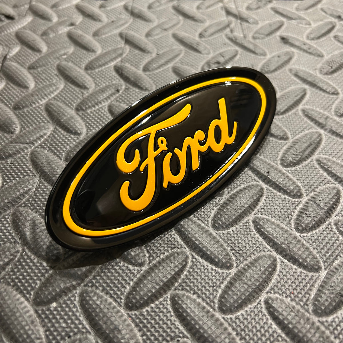 Genuine Ford Grille/Tailgate Badge - Painted Tangerine Screem and  Gloss Black