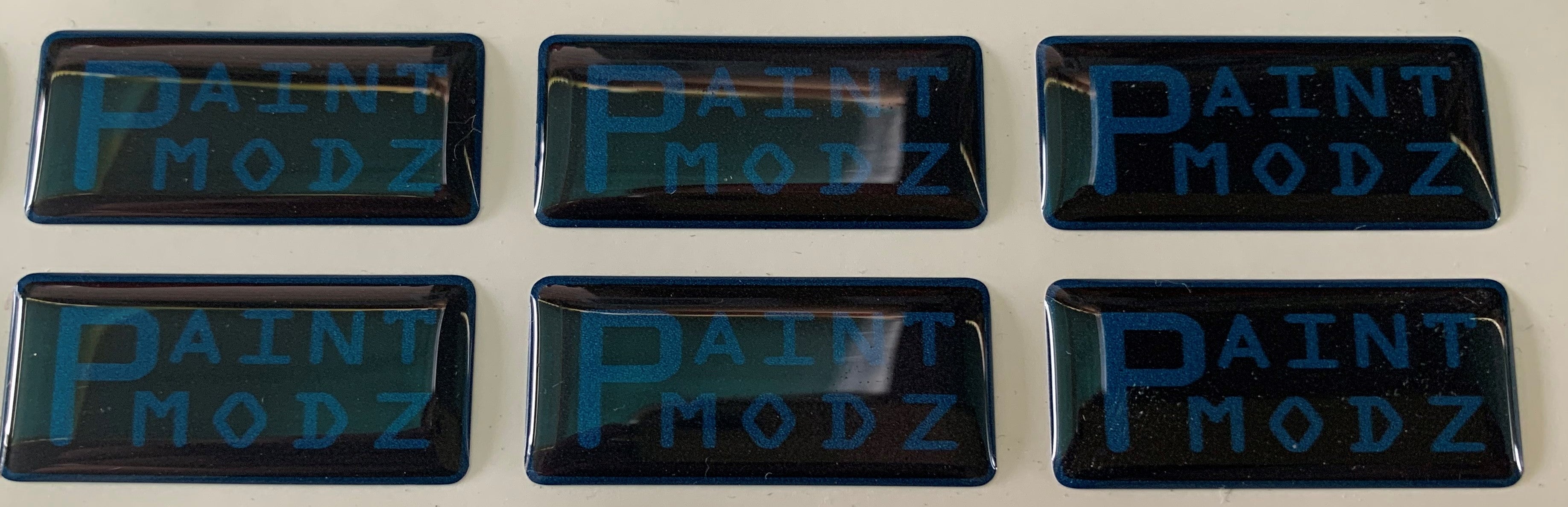 Paint Modz custom gel badges